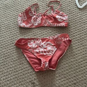 red tropical roxy pattern swimsuit set, size large ( girls )